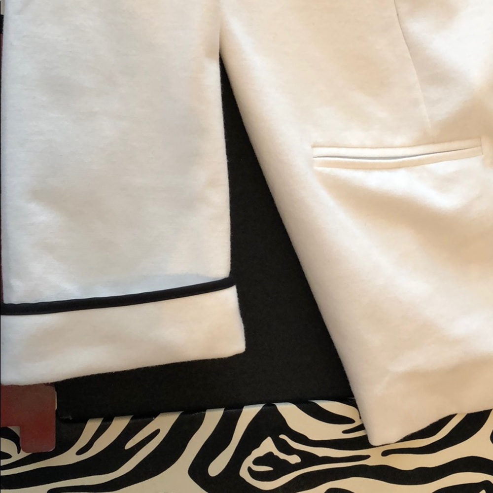 White Blazer with Black Trim